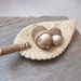 Hand sculpted acorns with a unique leaf bowl