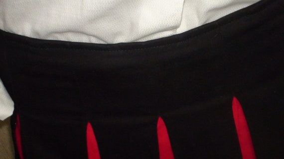 Cheerleader skirt in red and black. Cotton and Lycra. Made in
