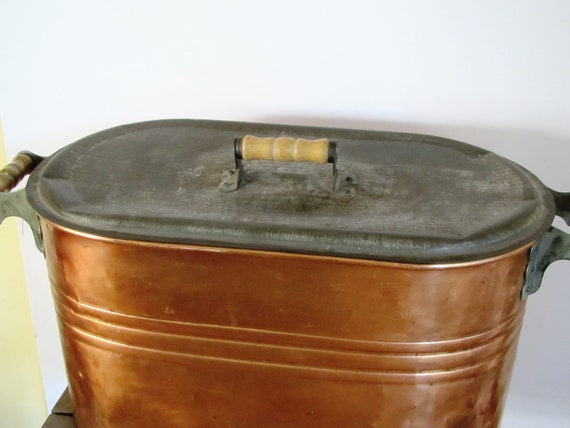 Vintage copper boiler tin lid with wood handles