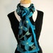 Nuno felt scarf: turquoise, aqua and teal flowers on black silk chiffon
