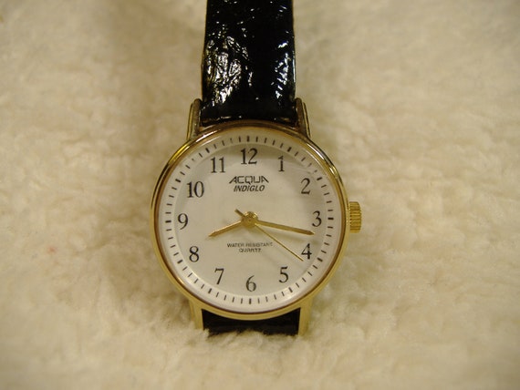 acqua indiglo watch