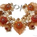 Crème Caramel Floral Crystal Pearl Cluster Silver Charm Bracelet
