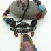 Blue Madonna. A Religious Tin Bezel Reliquary Necklace