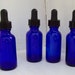 One Ounce Cobalt Blue Bottles With Eye Droppers