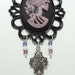 Gothic Lolita Necklace with Czech Crystals, with Zombie Girl and Fleur de Lis Charms - Strung On Triple Strand Purple Organza Ribbon