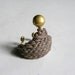 A Little Bell Crown Ring : Black crochet waxed cord with brass bell