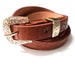 New Bright Brown Mustard Accessorized Women's Belt with Gold Graved in Floral Pattern Buckle.