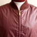 vintage 80's reversible waterproof burgundy nylon/grey cotton blend twill men's/unisex windbreaker/collegiate bomber jacket, men's size medi