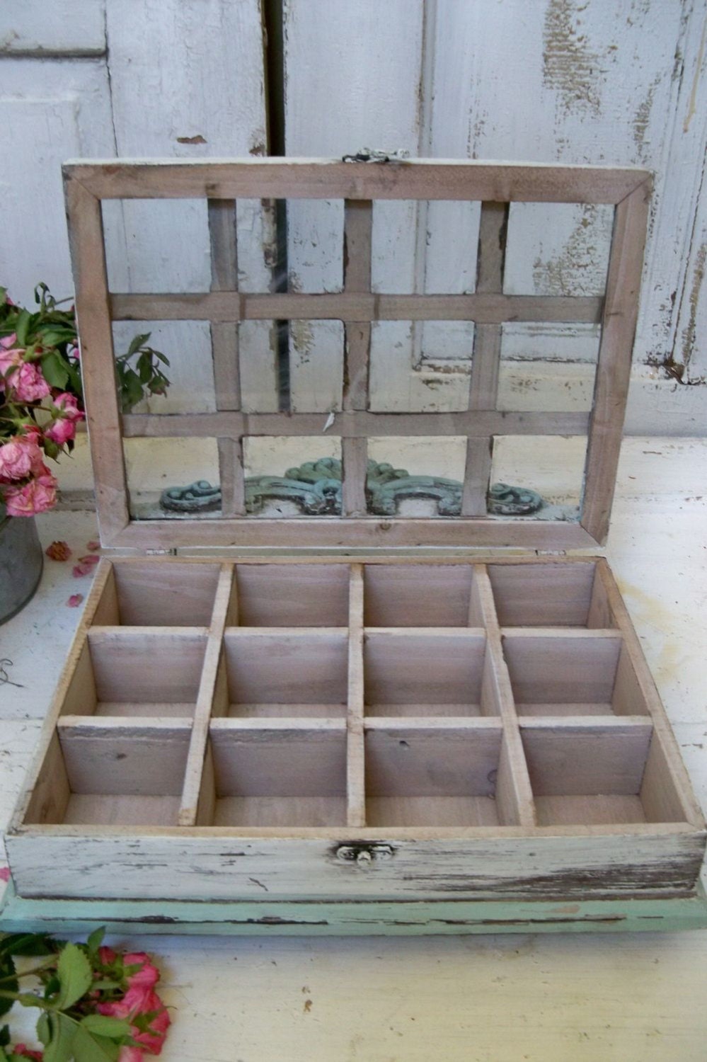 Ornate wooden display box with glass lid compartments