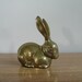 Vintage brass rabbit paperweight or figurine with perky ears