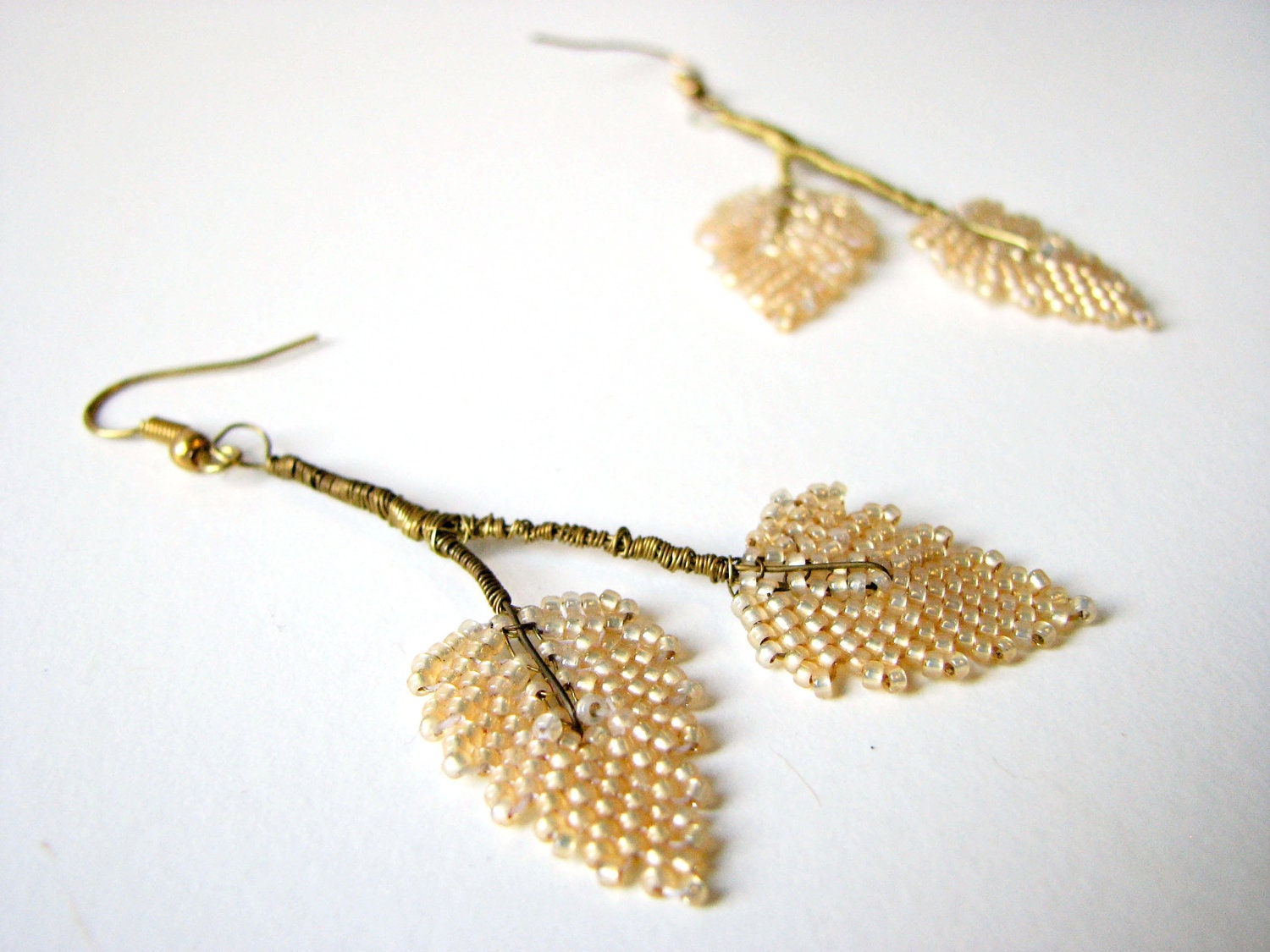 Gold bead and wire leaf earrings