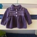 Purple smocked style cardigan, baby girl to about 6 months