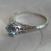18 K Antique Engagement Ring in White Gold Filigree, Hallmarked, Natural Mined Blue Topaz