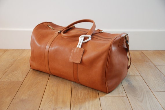 Items similar to Brown leather duffle bag on Etsy