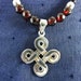 Sterling Silver Cross Necklace with Garnets
