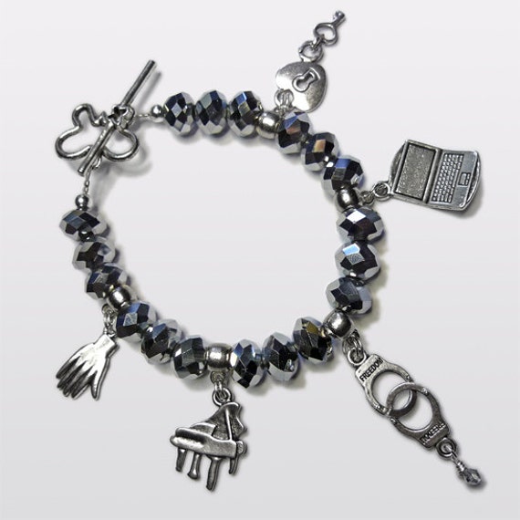 Fifty Shades inspired bracelet with 5 charms.