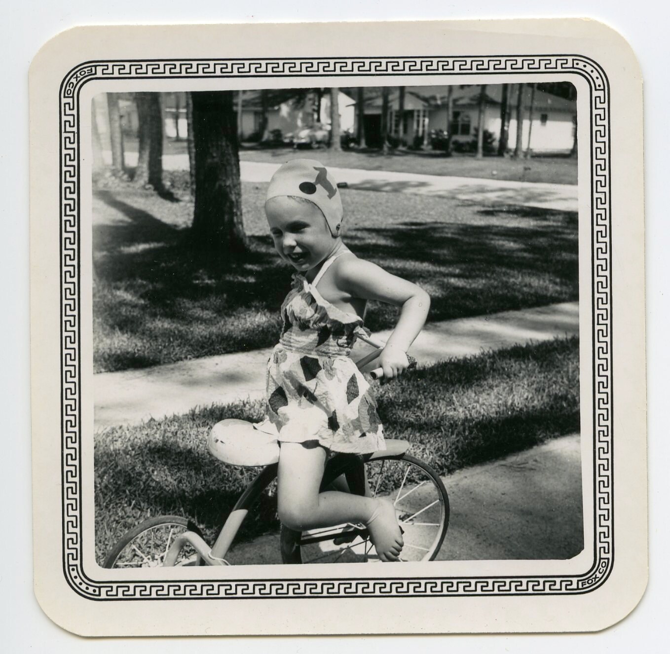 1950 Little Girl in Swimcap and Bathing Suit Rides by Snapatorium