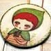 Little Green Riding Hood - Original Mixed Media Folk Art Whimsical Painting By Danita Art - 8 Inches On Round Canvas