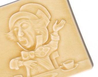 Alice in Wonderland's - The Mad Hatter - Handmade ceramic tile in goldenrod