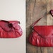 1970s vintage cranberry eel skin shoulder bag