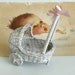 Vintage wicker mini baby carriage toy or home decor