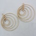 Pair of 5 Hoop Gold-tone Charms