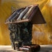 Bark and Moss Hanging Bird Feeder with Rustic Log Roof and Pine Cone Accent