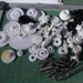 pile of plastic gears and springs gearpunk steampunk, maker, industrial art