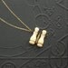 Antique Victorian Stanhope Charm Necklace . Tiny Binoculars . Scenes of Niagara Falls.