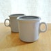 set of two early dansk denmark mugs