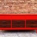 Mid Century Dresser In Tangerine