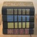 set of four readers digest books with graphic covers
