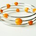 Orange Bracelet on Memory Wire Bangle Style