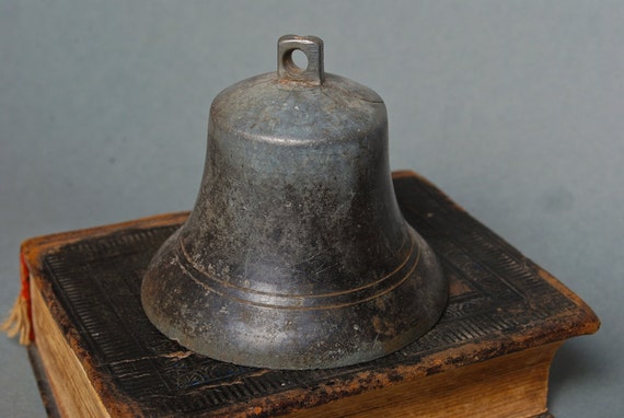 Antique big metal bell without clapper.