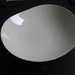 Eva Zeisel design for Castleton, Serving Dish, bowl. Looks like Museum except for silver rim. Symmetra. Vintage white Porcelain.