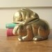 Pair of brass bunny bookends. Pair of brass bunny nursery decor. Twin bunnies.