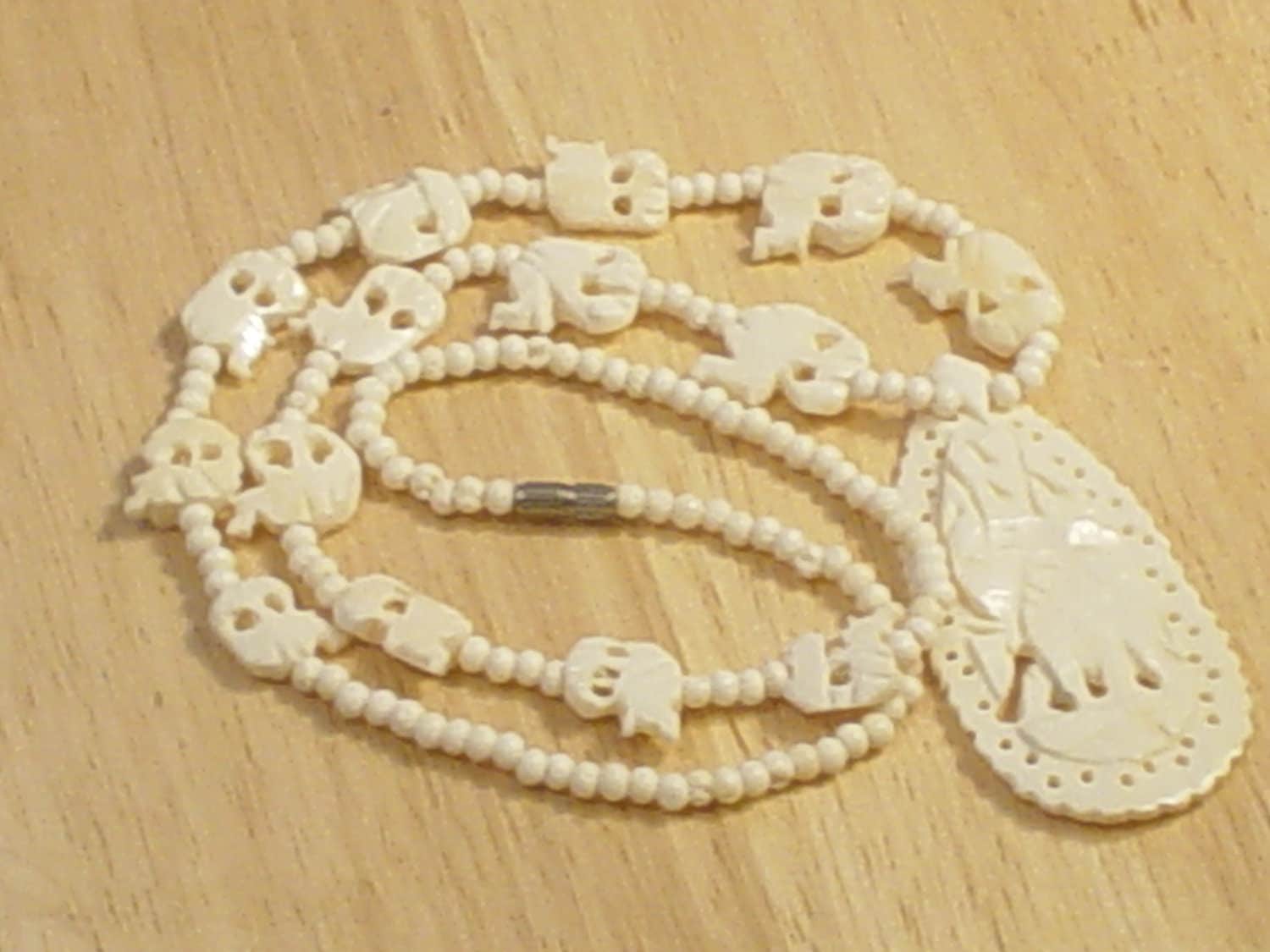 Vintage Faux Ivory Carved Elephant Necklace