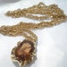 Amber honey colored stone set in gold tone necklace