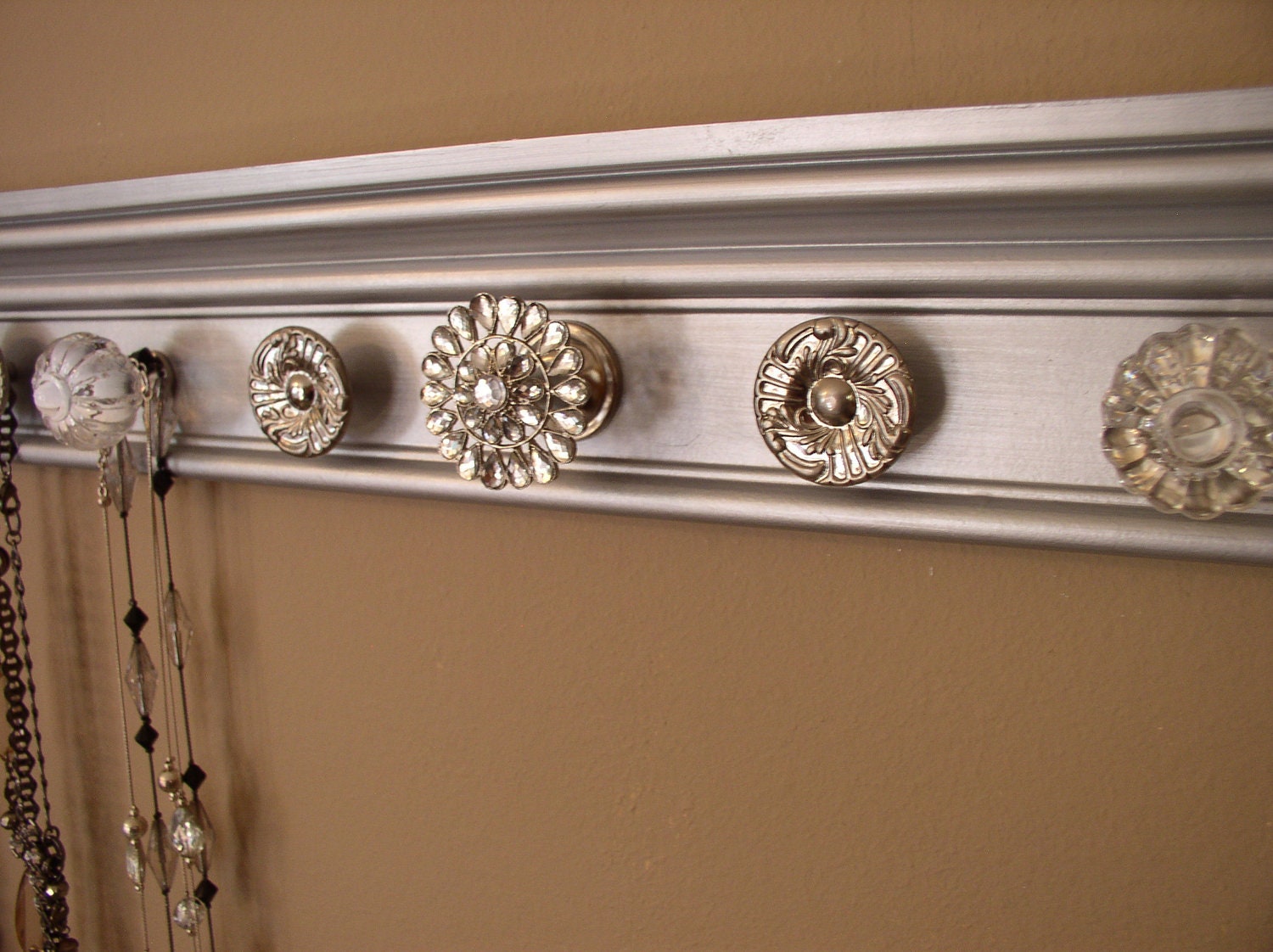 jewelry/ necklace holder with 9 decorative knobs by Gotahangup