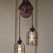 Upcycled Vintage Farm Pulley Lighting Pendant with Bulb Cages