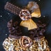 Baby GIRL outfit - onesie, romper, bodysuit - Newborn to Size 12 months- Ruffled leopard print with rhinestone BLING - matching headband