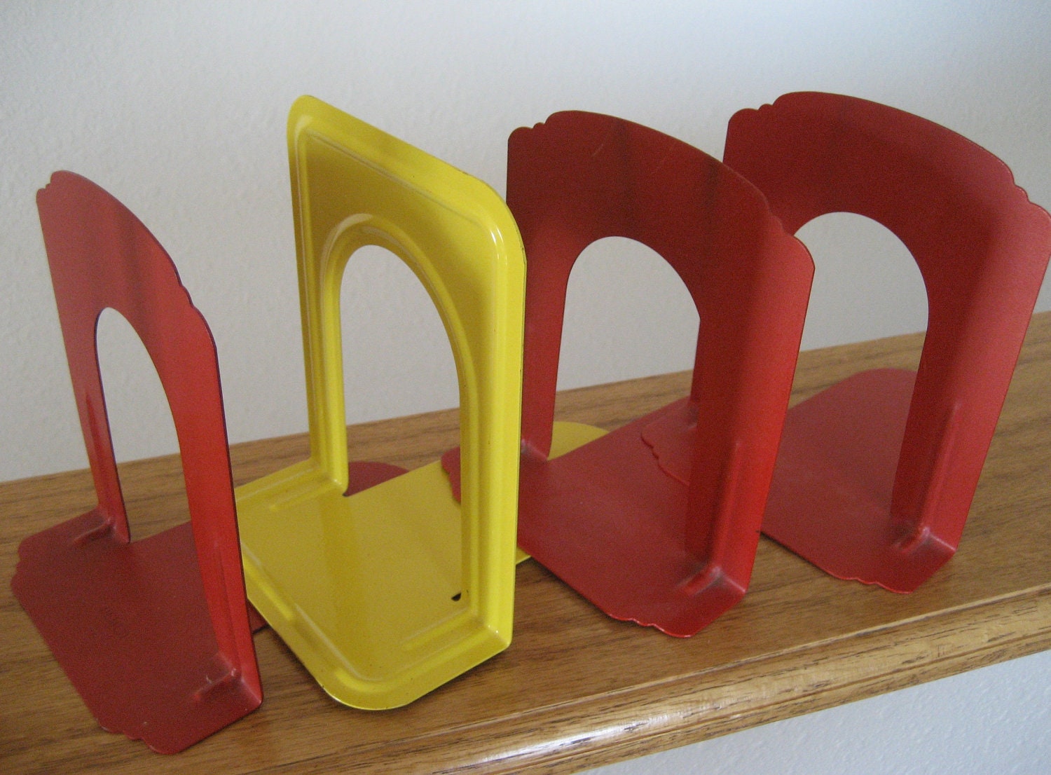 Vintage metal office bookshelf dividers. Original red and