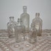 Vintage clear glass medicine bottles lot collection