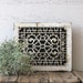 cast iron heating grate white paint - urban farmhouse style - shelf display scrolled iron work