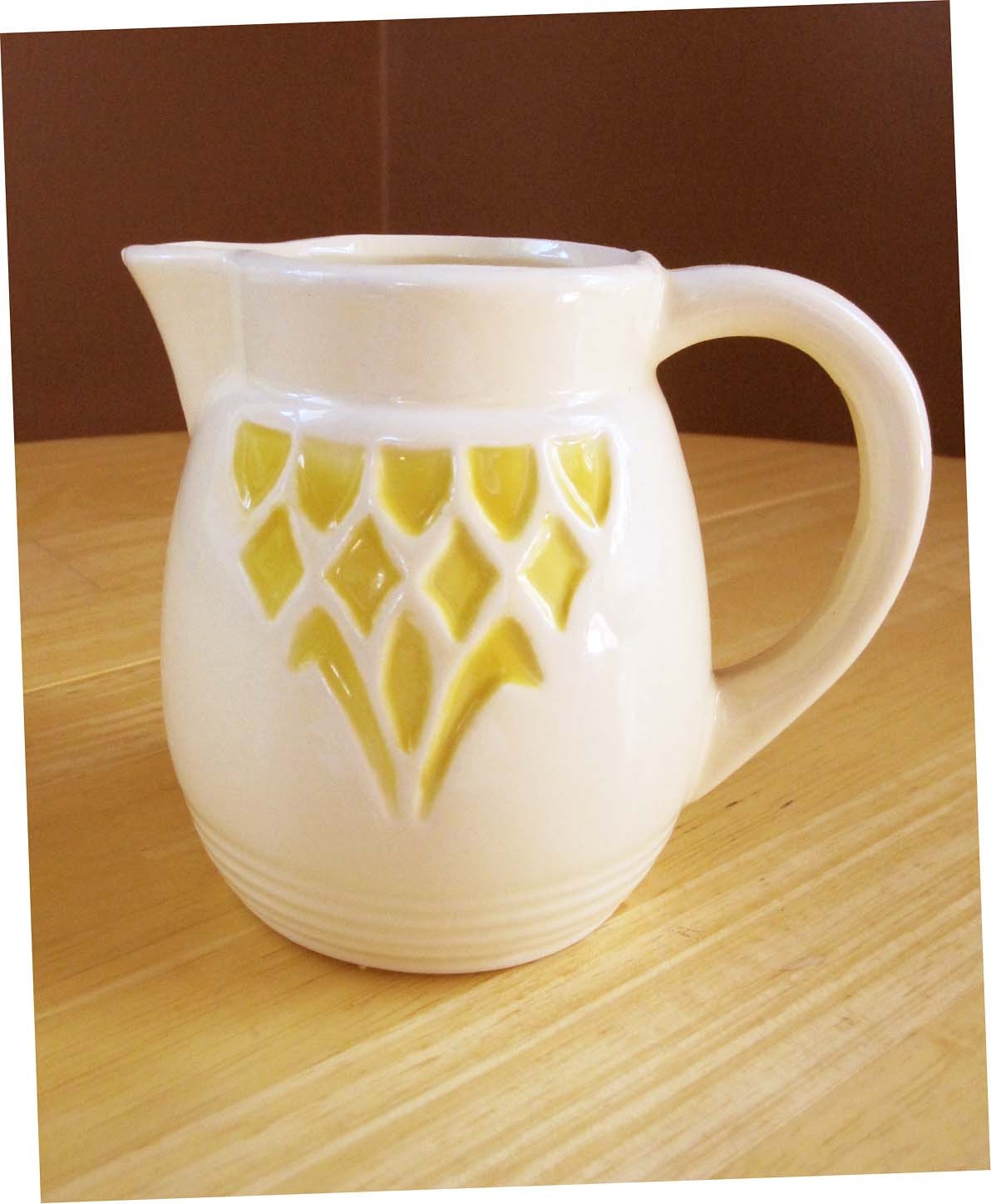 R.R.P. Co. Roseville Ohio Pottery Small Pitcher in OffWhite