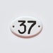Vintage enamel number sign 37