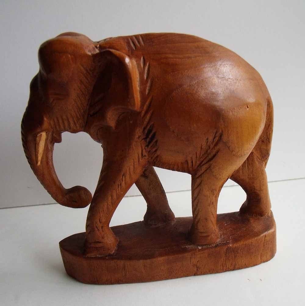 Vintage wooden Indian Elephant sculpture has great grain and