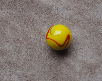 Glass Marble, yellow with blue, red and white streaks