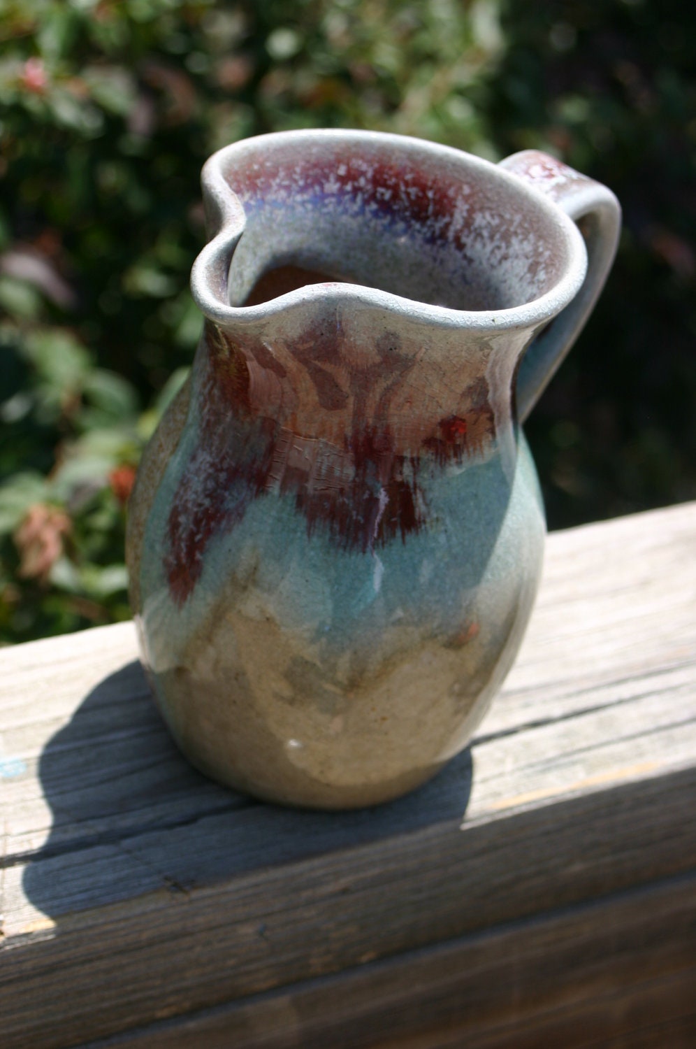 salt-glazed-pottery-pitcher-with-copper-glazed-rim