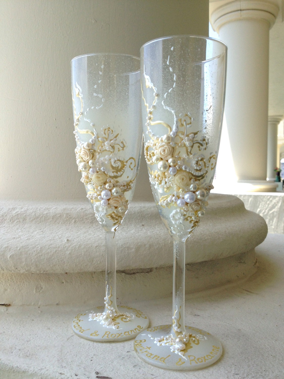 Wedding champagne glasses in ivory and white wedding toasting